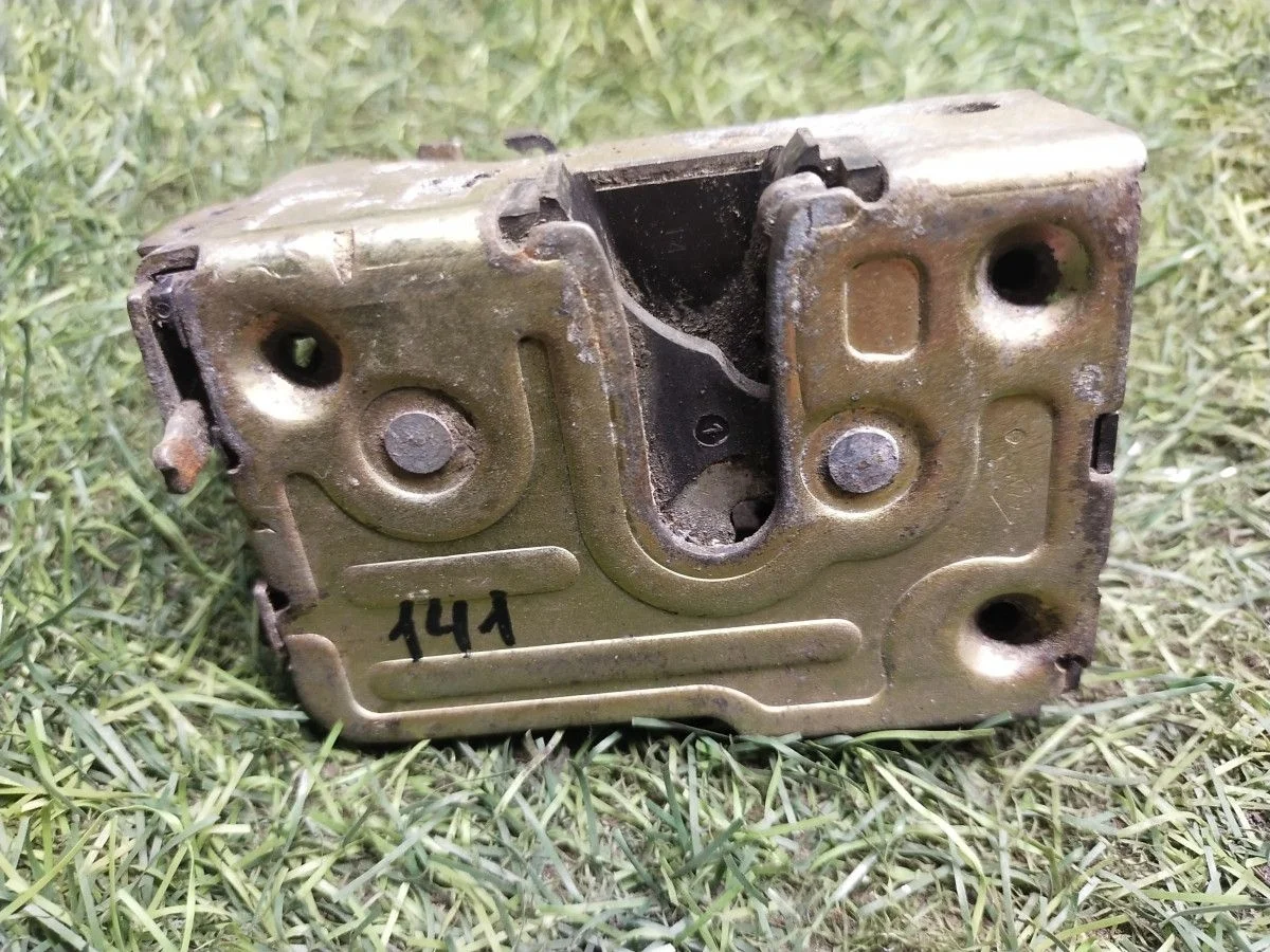 Замок двери задний левый Renault Logan