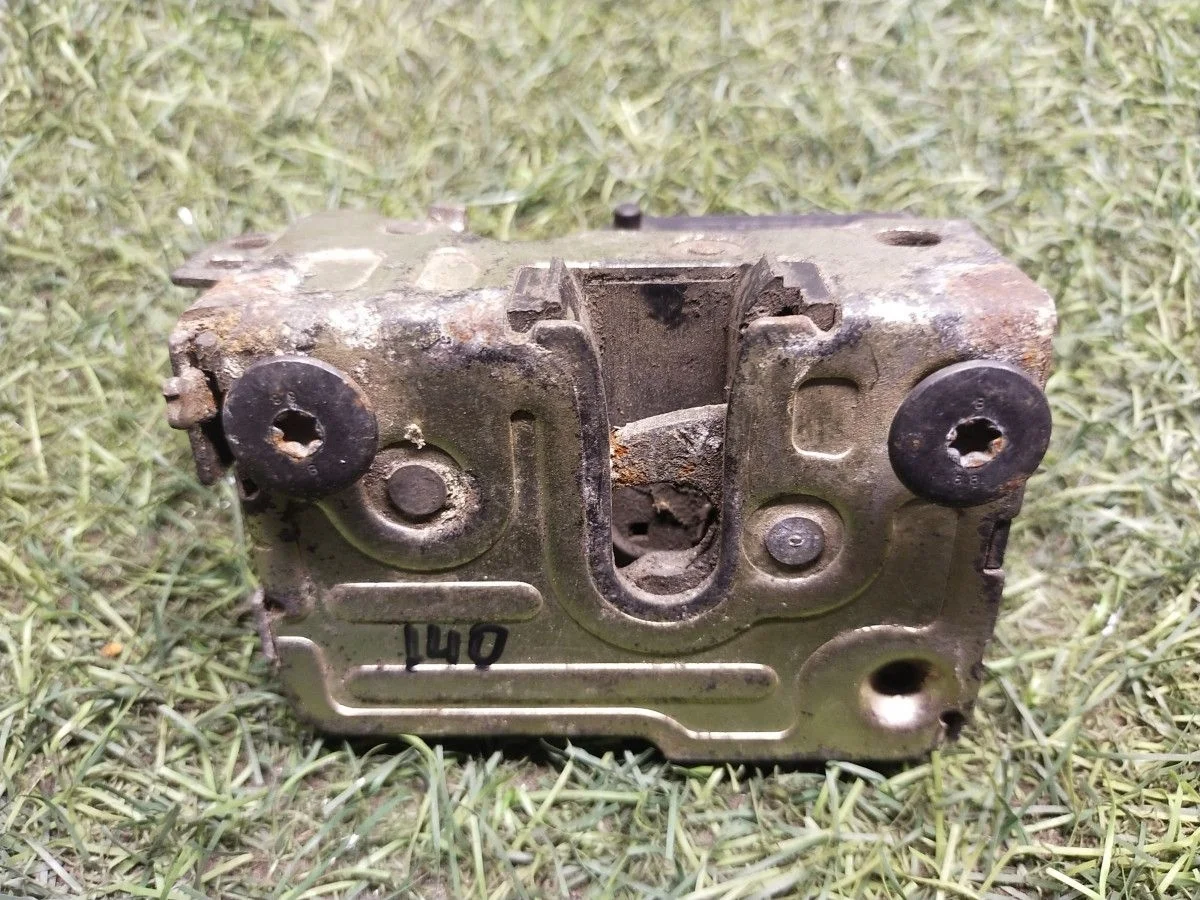 Замок двери задний левый Renault Logan