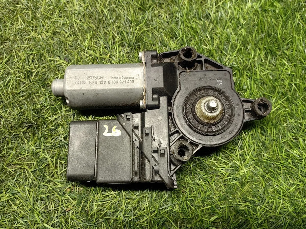 Моторчик стеклоподъемника задний левый Volkswagen