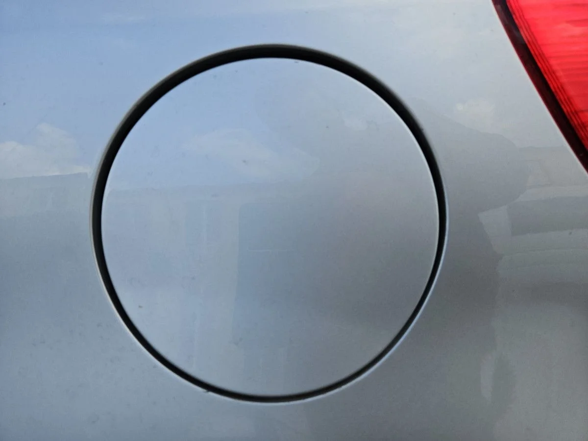 Лючок бензобака на Suzuki SX4