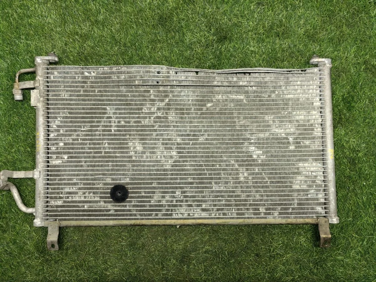 Радиатор кондиционера Daewoo Nexia