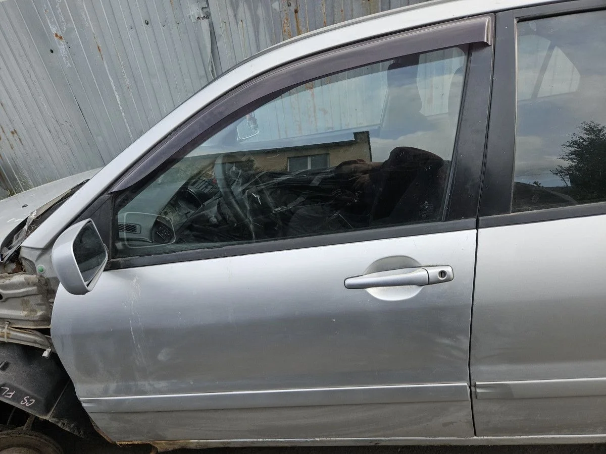 Дверь передняя левая на Mitsubishi Lancer 9