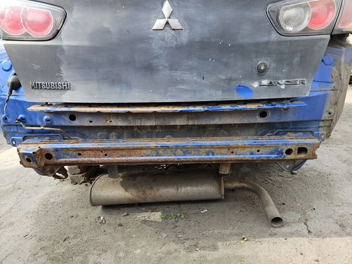 Усилитель заднего бампера на Lancer 10