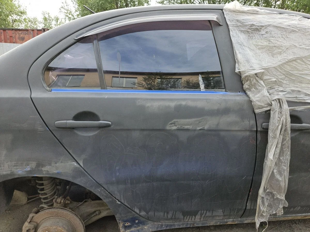 Дверь задняя правая на Mitsubishi Lancer 10