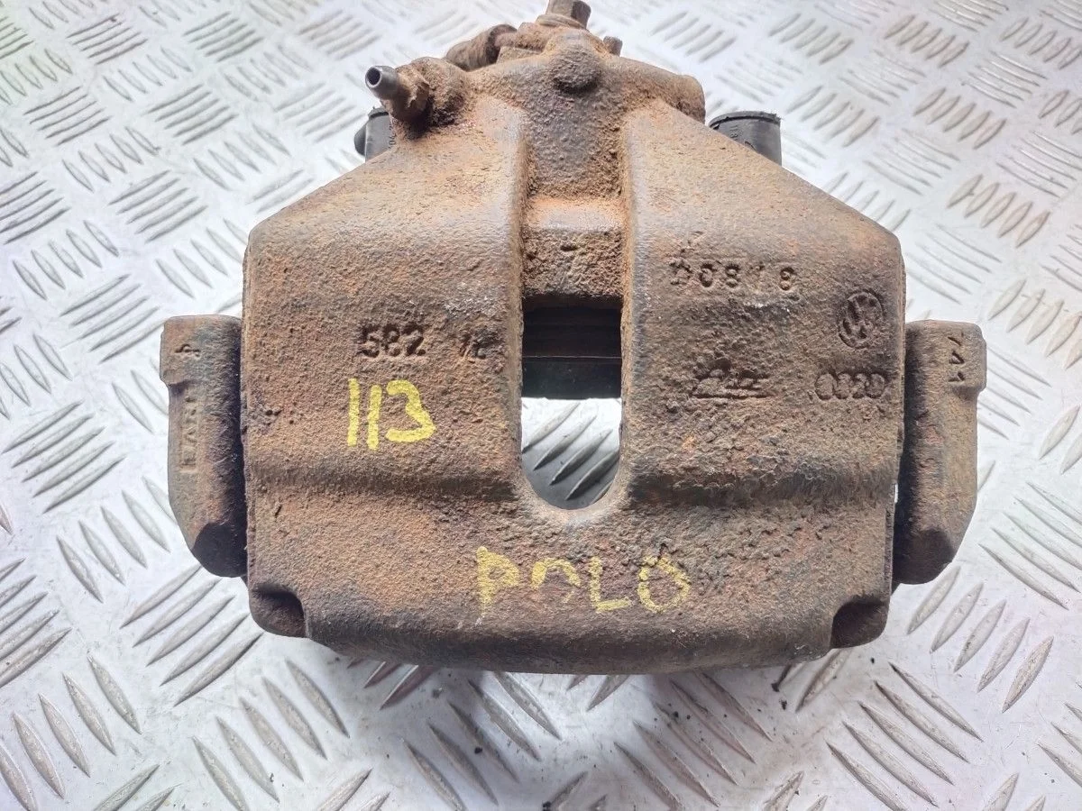 Суппорт передний правый Volkswagen Passat B6