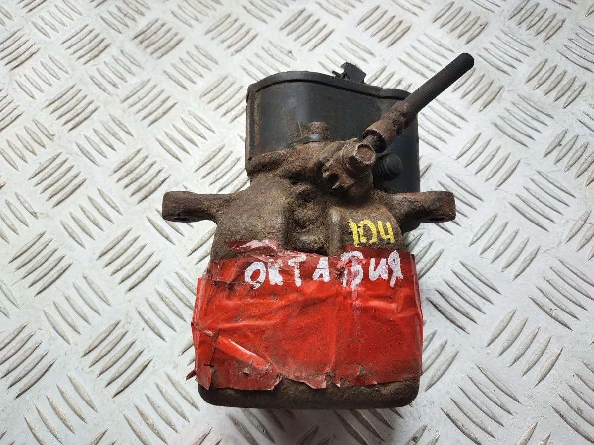 Суппорт задний левый Volkswagen Passat B6