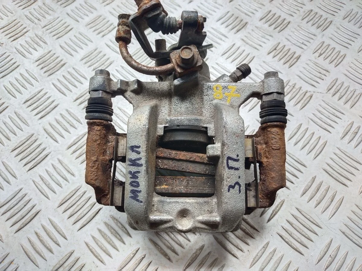 Суппорт тормозной Opel Mokka