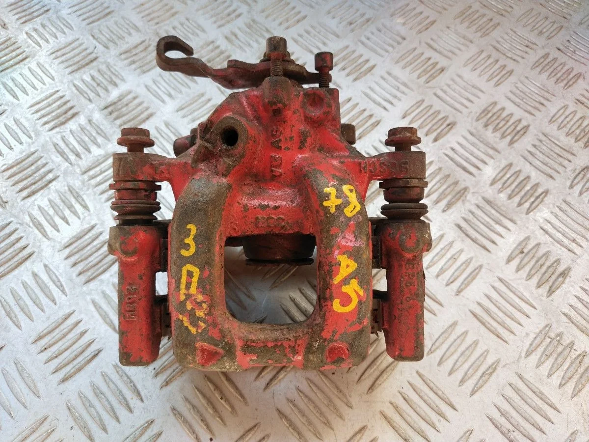 Суппорт тормозной задний правый Volkswagen Golf