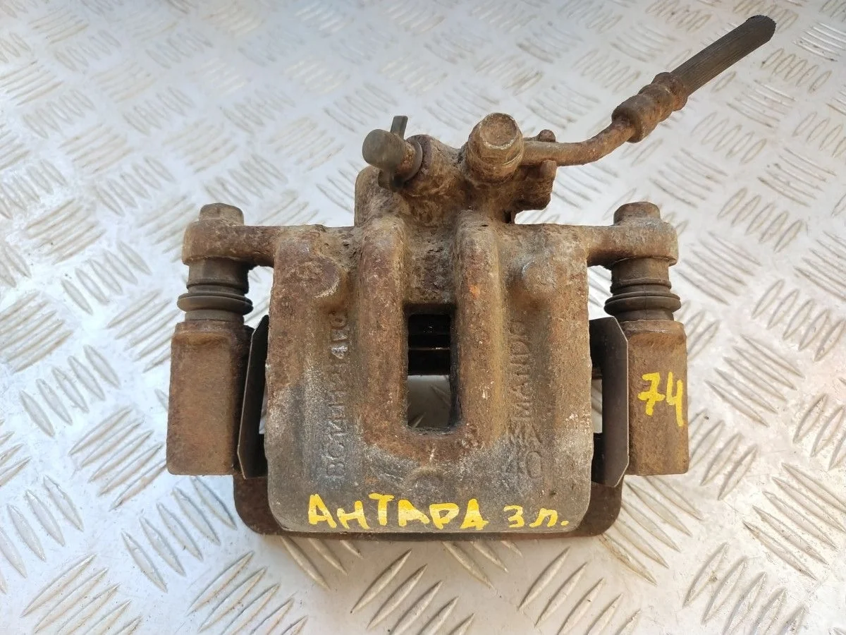 Суппорт тормозной Задний Правый Opel Antara