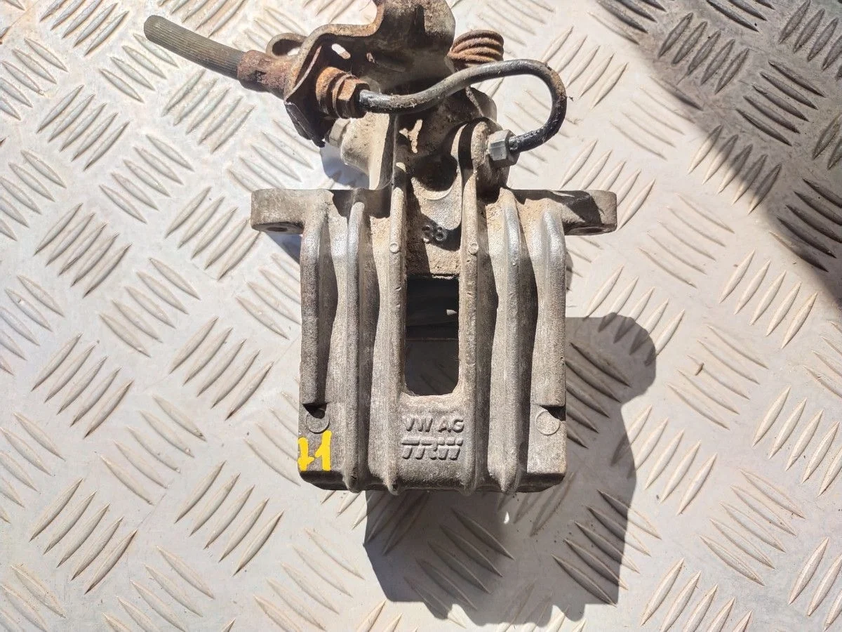 Суппорт тормозной задний правый Skoda Octavia