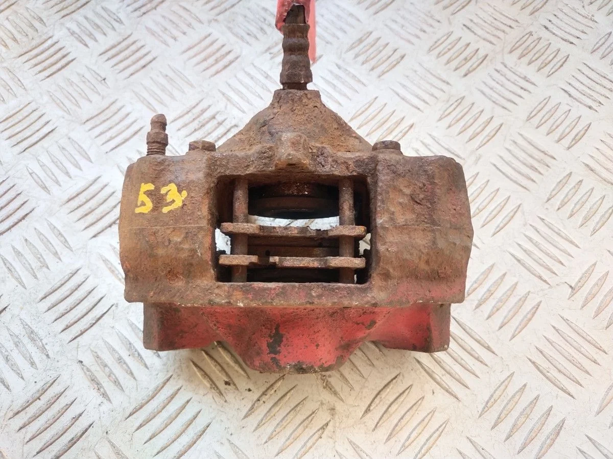 Суппорт тормозной задний левый Mercedes-Benz W210