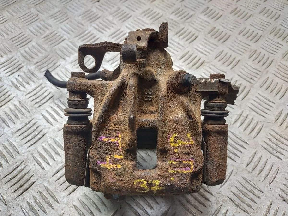 Суппорт тормозной задний правый VW Transporter T4