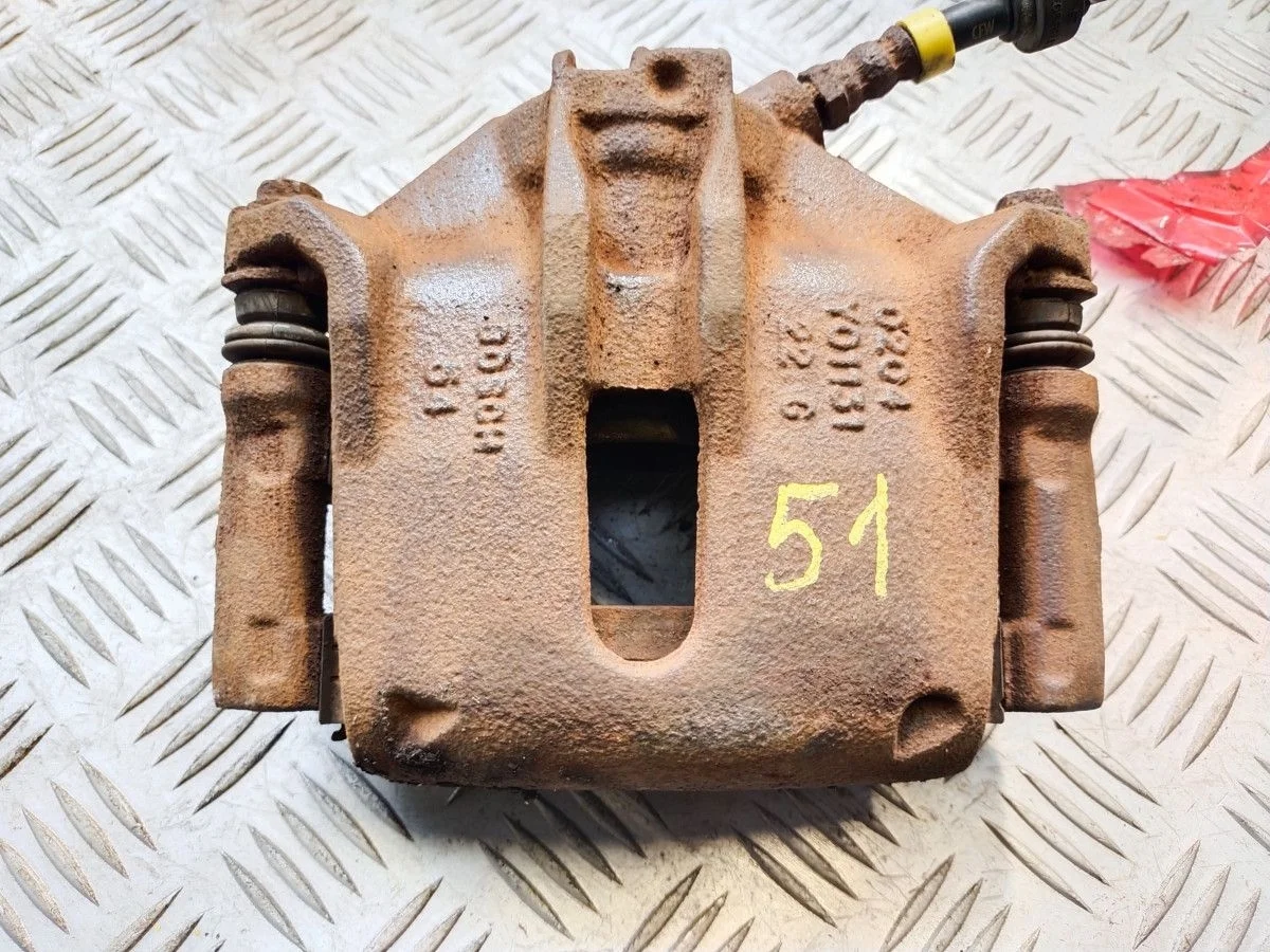 Суппорт тормозной  Peugeot Partner