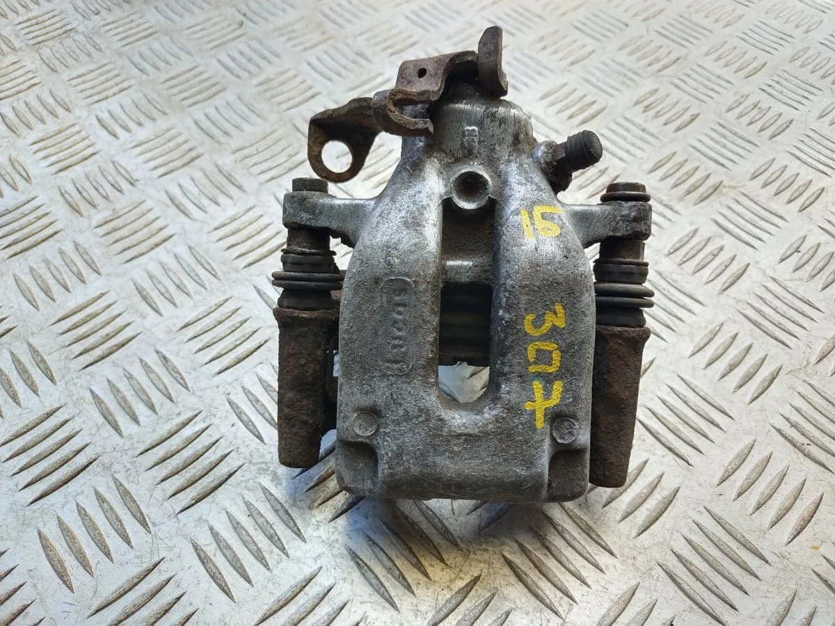 Суппорт задний правый Peugeot 307