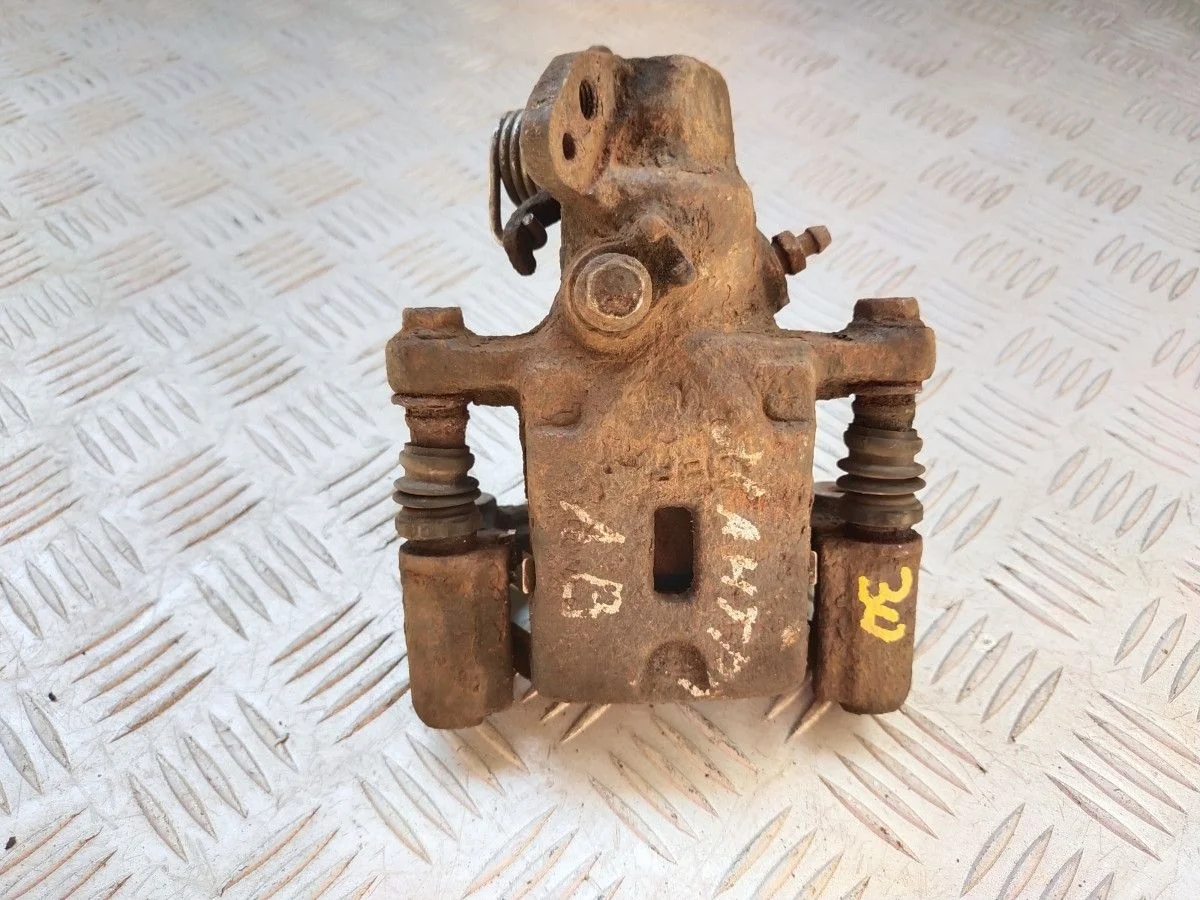 Суппорт задний левый Hyundai Elantra