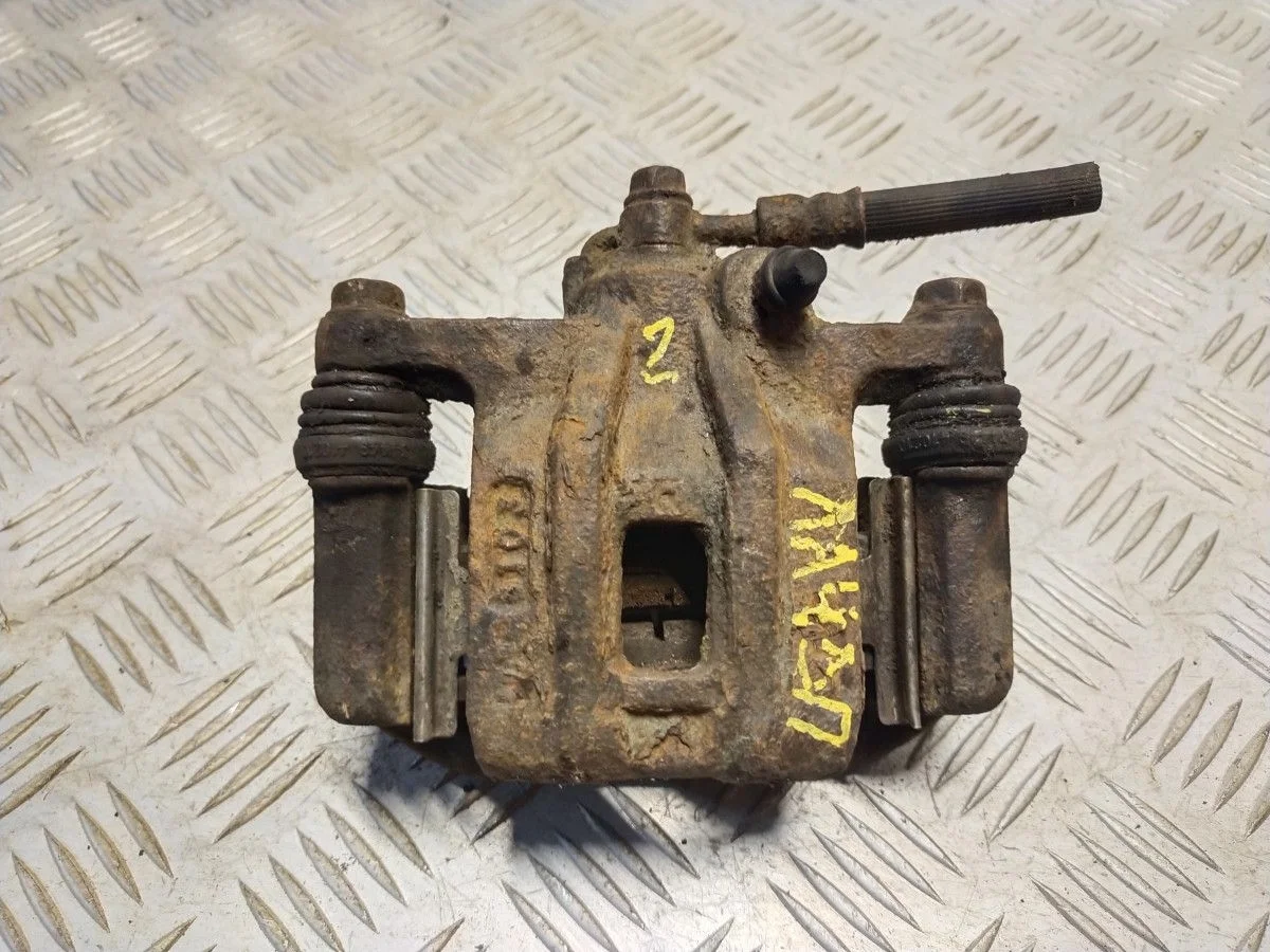 суппорт задний правый Chevrolet Lacetti