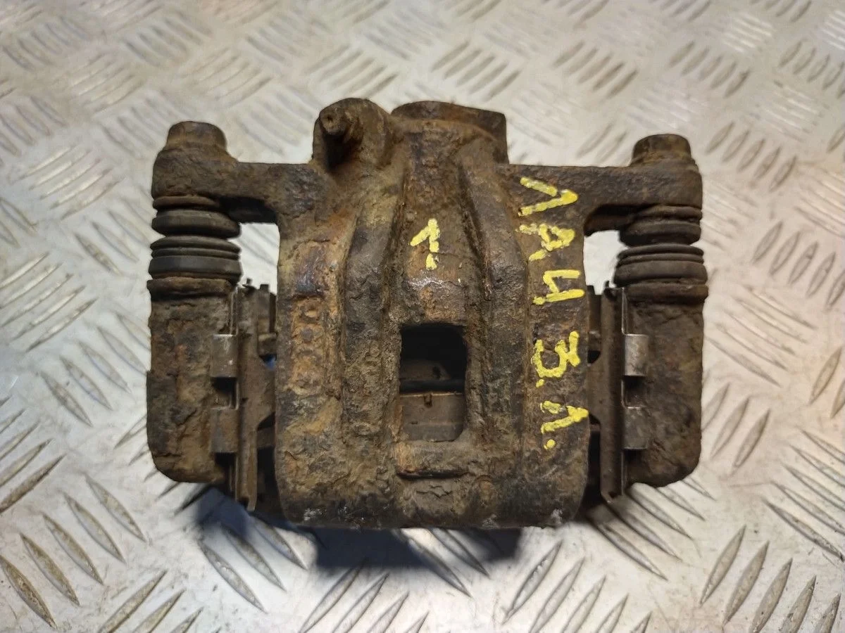 Суппорт задний левый Chevrolet Lacetti