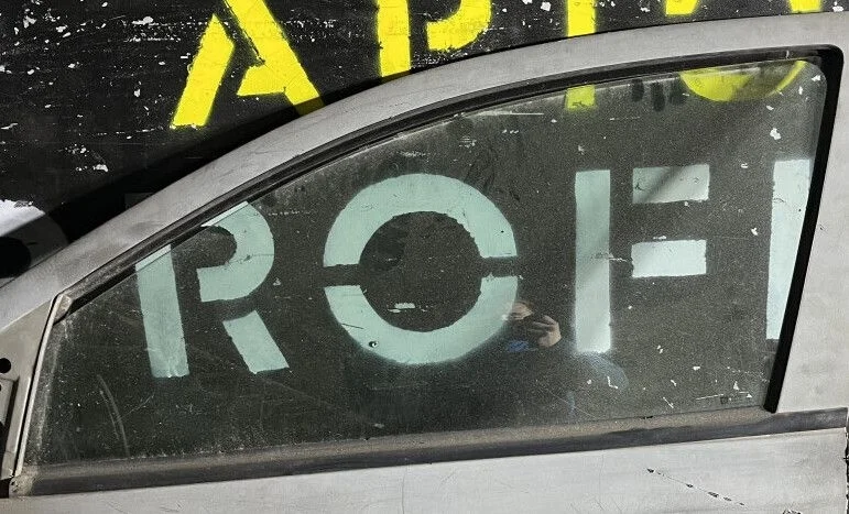 Стекло передней левой двери Opel Astra H