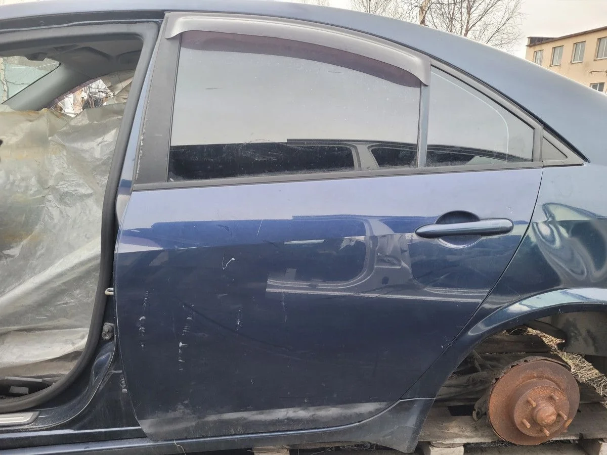 Дверь задняя левая на Nissan Primera P12