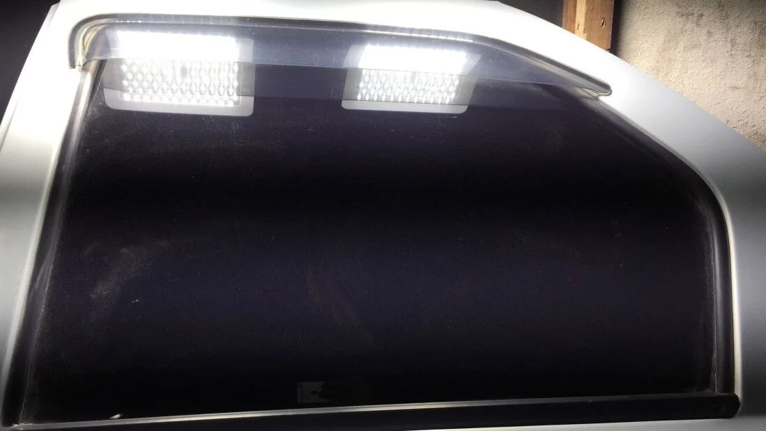 Стекло задней левой двери Renault Logan 1