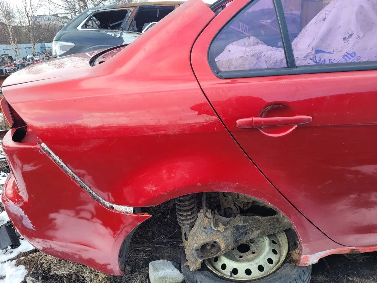 Крыло заднее правое на Lancer 10