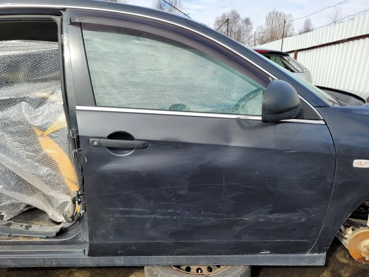 Дверь передняя правая на Nissan Almera G15