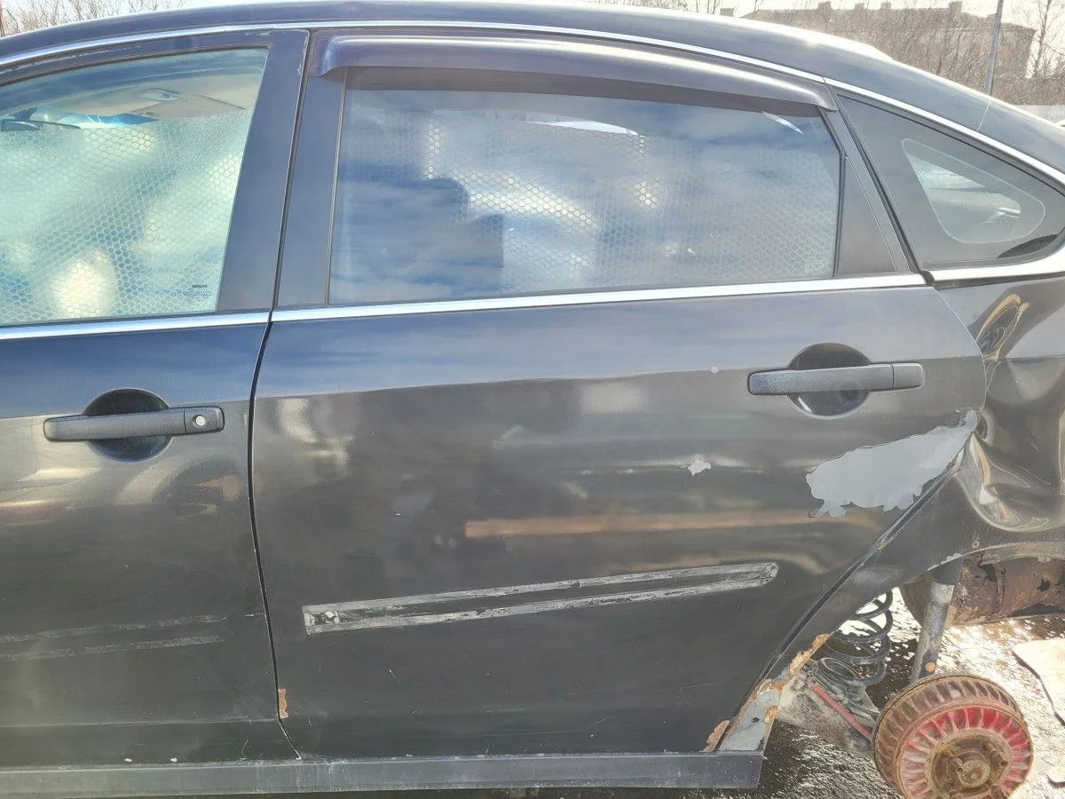 Дверь задняя левая на Nissan Almera G15