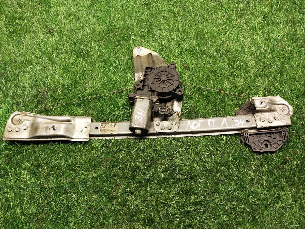 Стеклоподъемник передний левый Renault Logan