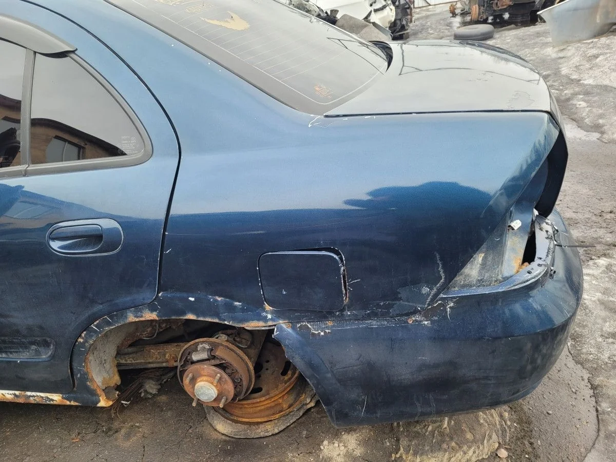 Крыло заднее левое на Nissan Almera B10