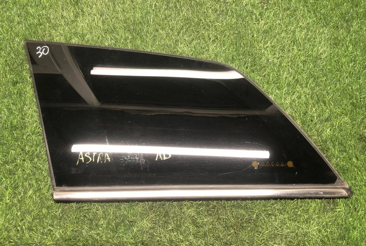 Стекло кузовное левое Opel Astra H