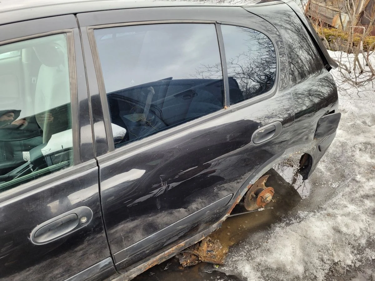 Дверь задняя левая на Nissan Almera N16