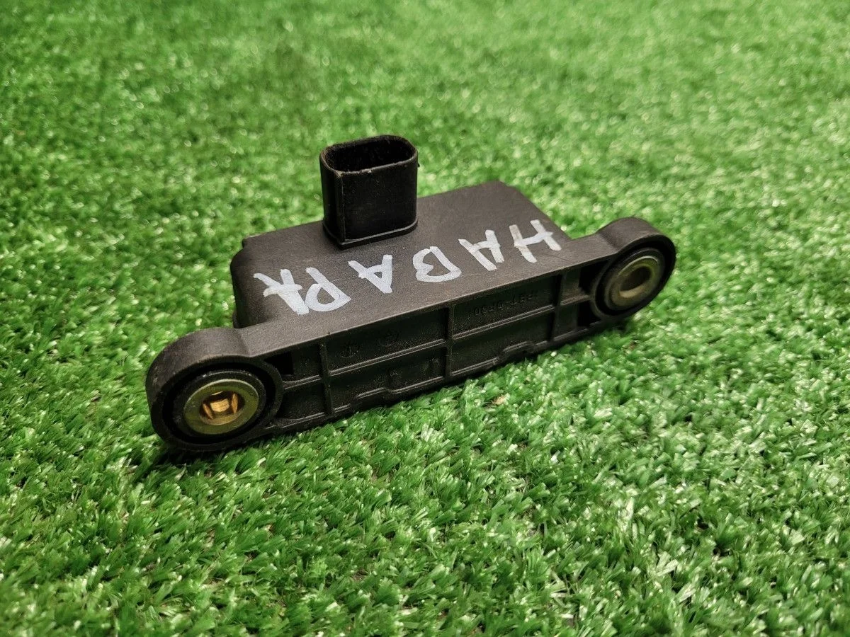 Датчик ускорения на Nissan Navara D40