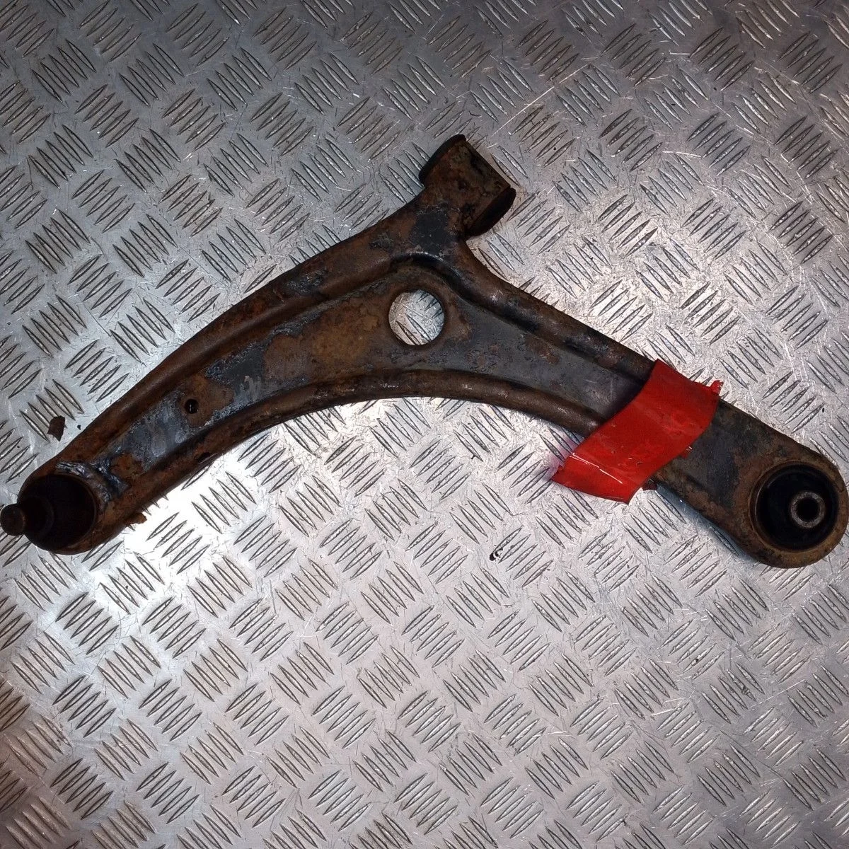 Рычаг передний левый Mitsubishi Lancer X