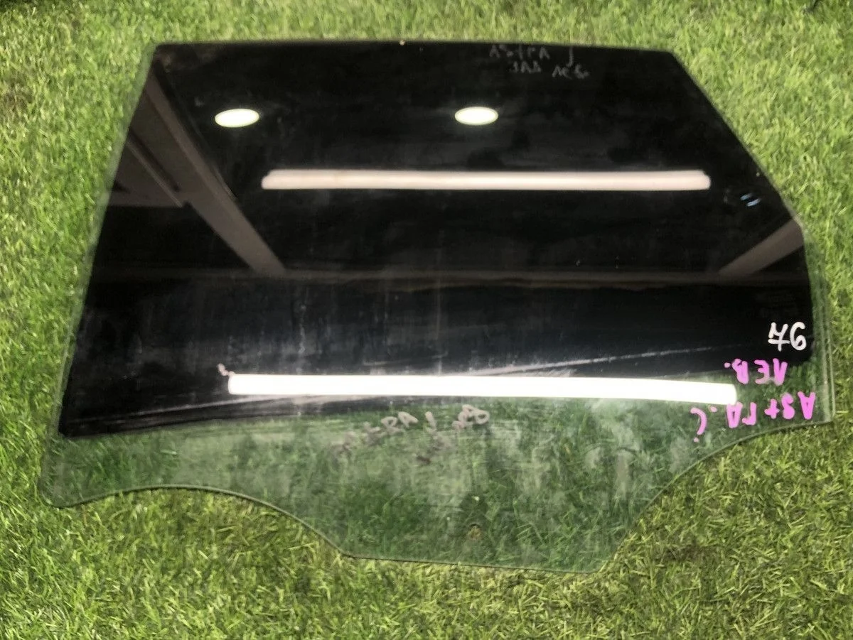 Стекло задней левой двери Opel Astra J