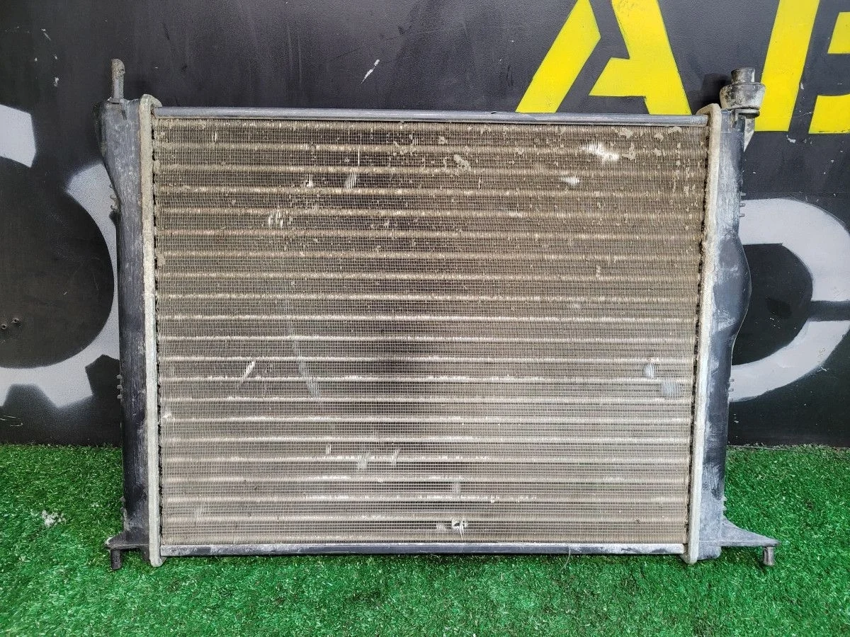 Радиатор основной подкапотный на Almera G15