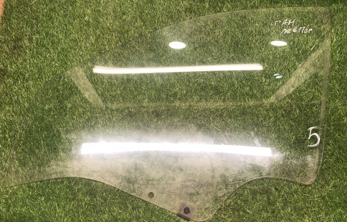 Стекло передней левой двери Renault Logan