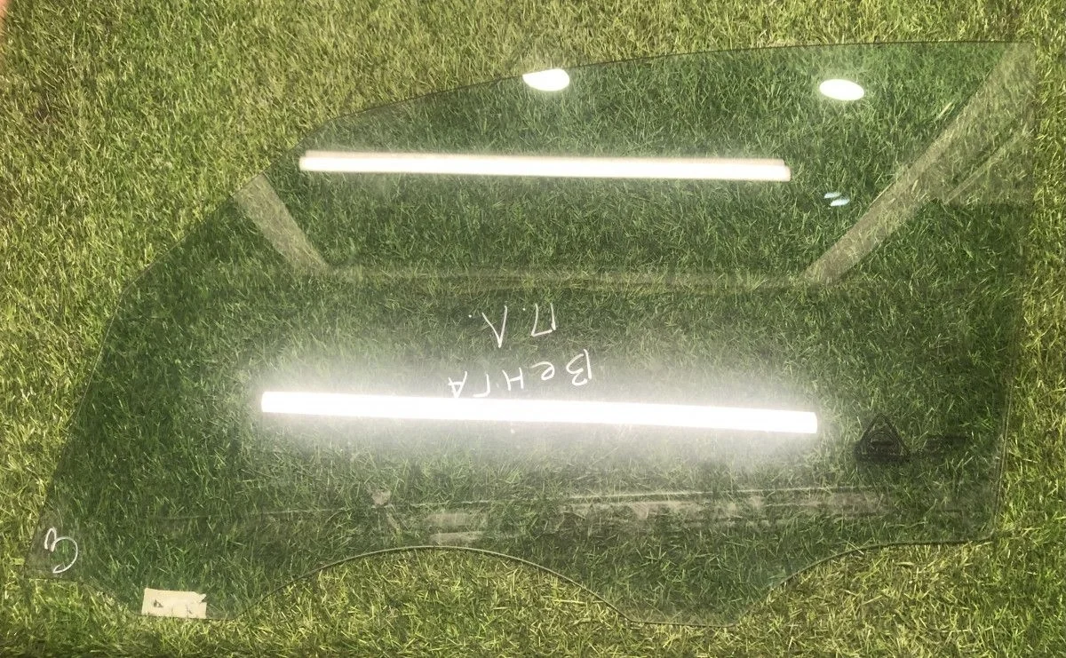 Стекло передней левой двери Kia Venga