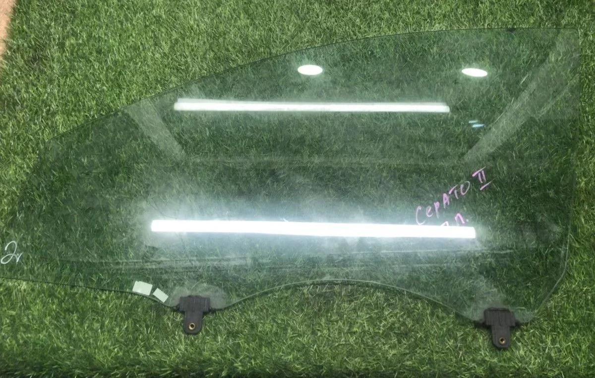 Стекло двери передней левой Kia Cerato II