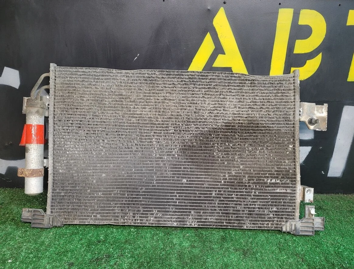 Радиатор кондиционера подкапотный на Lancer 10