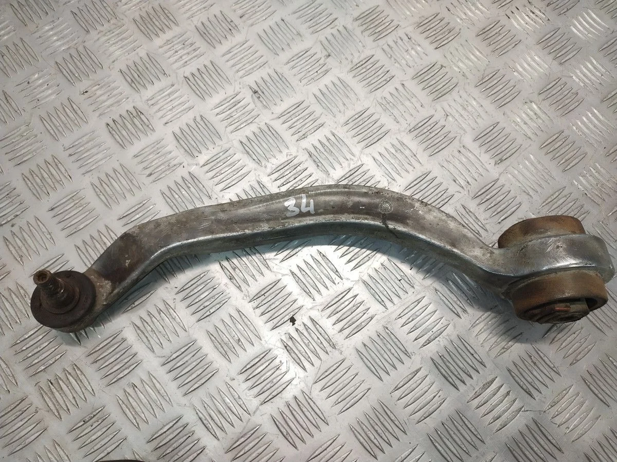 Рычаг левый Volkswagen Passat B5+