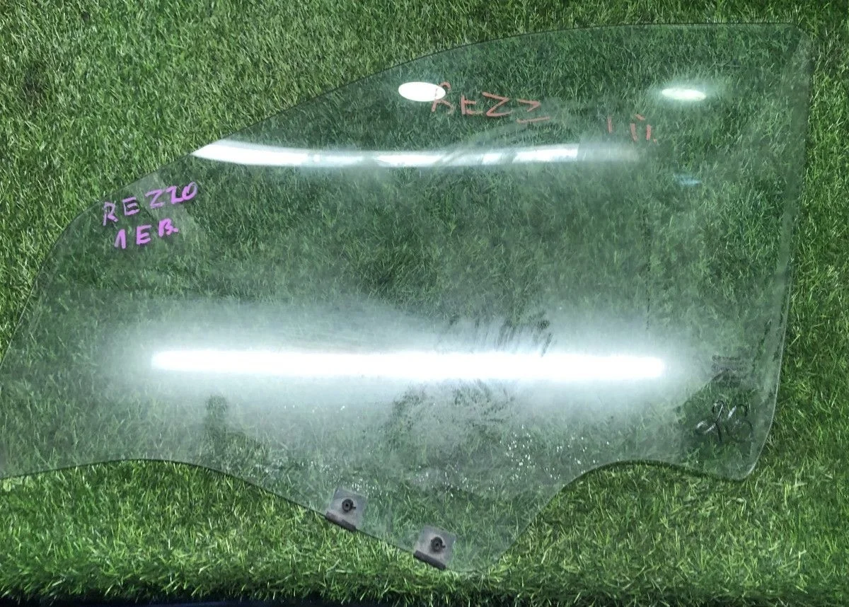 Стекло двери передней левой Renault Logan I   