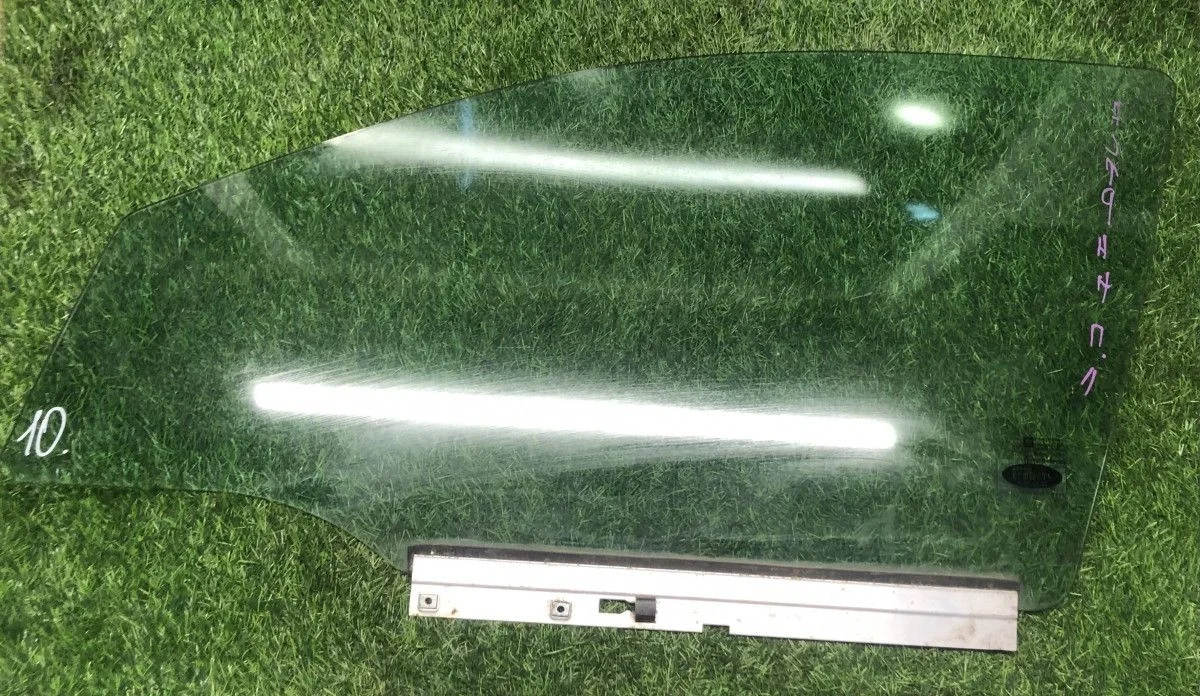 Стекло двери передней левой Opel Astra H