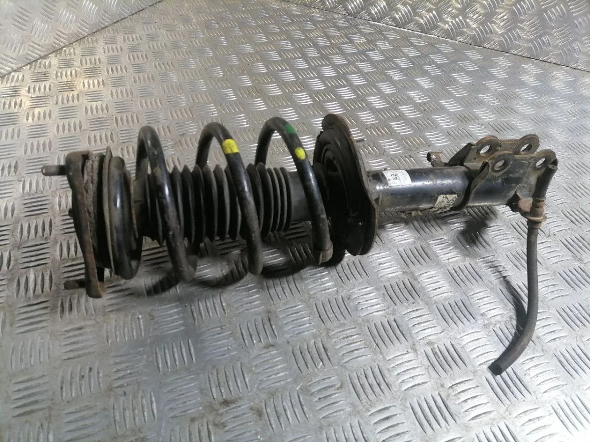 Стойка амортизатора передняя левая KIA Ceed