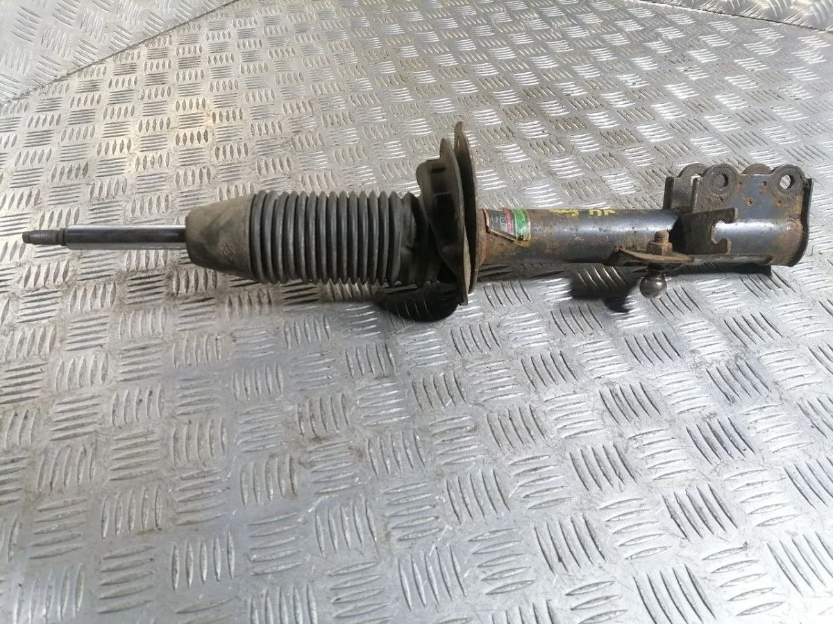 Стойка амортизатора задняя правая Daewoo Gentra