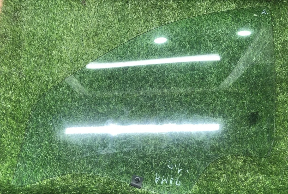 Стекло двери передней левой Renault Logan I