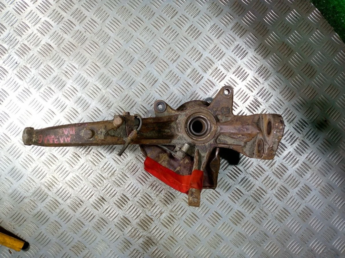 Кулак передний левый Mazda VI-GH