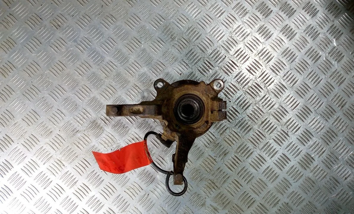 Кулак поворотный передний левый Lancer Xl