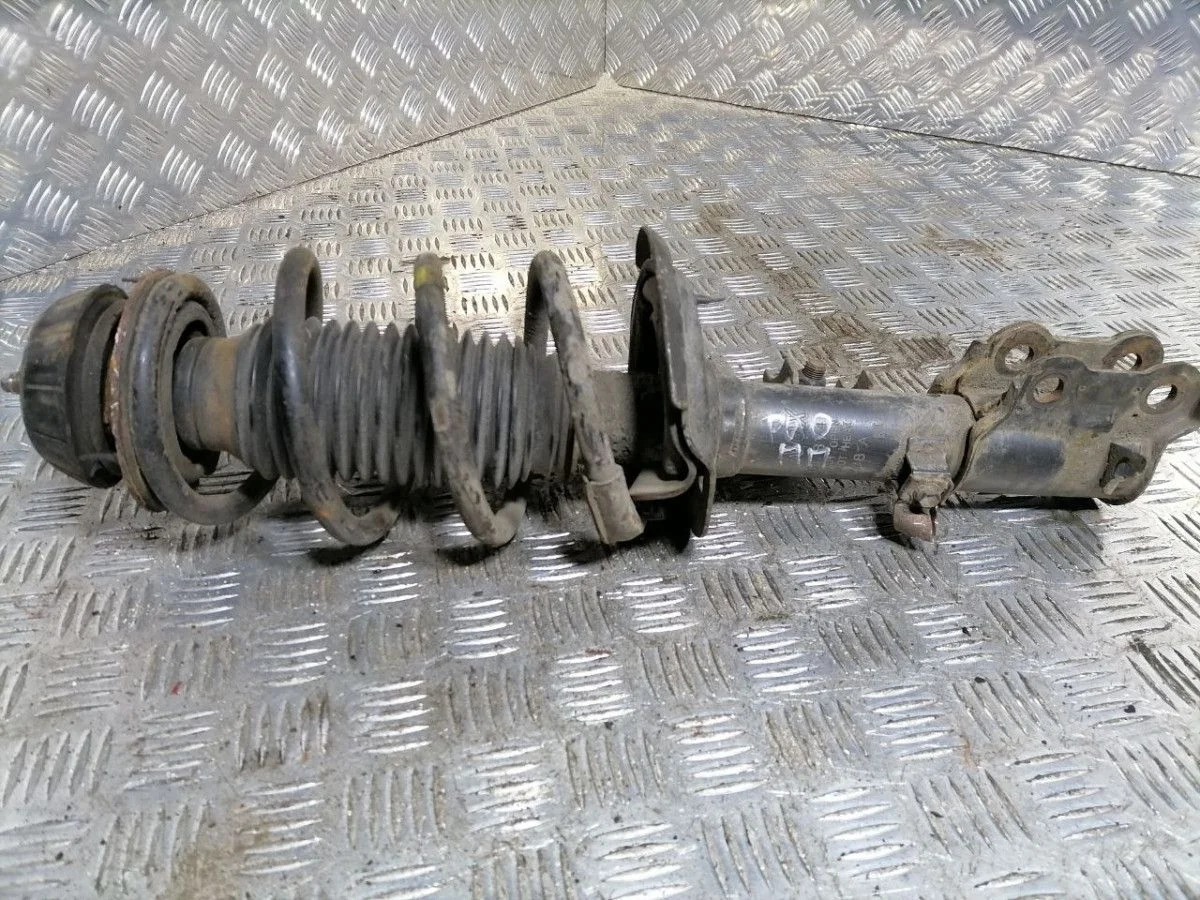 Стойка амортизатора передняя праввая KIA Rio 3