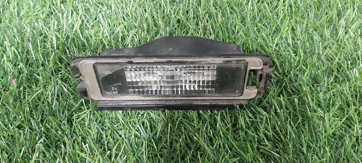 Фонарь подсветки номера Renault Sandero