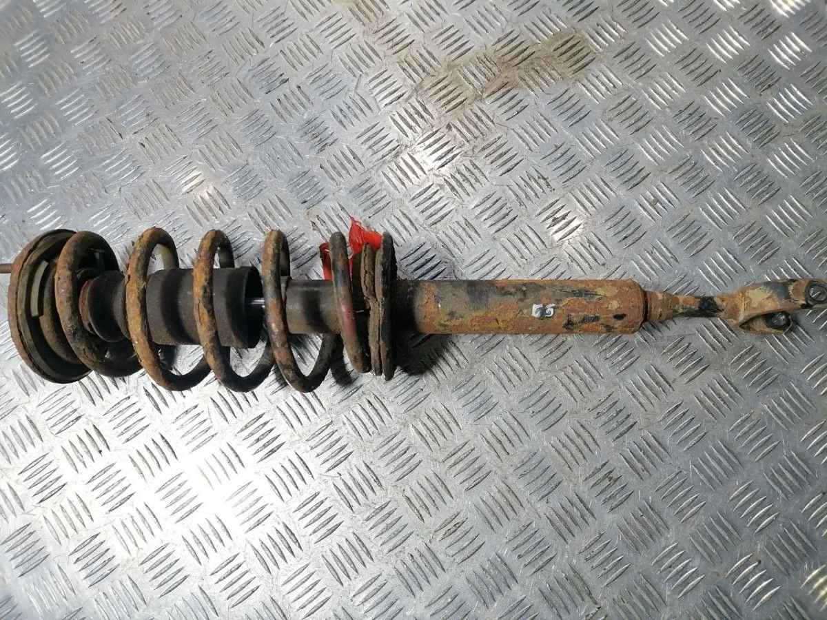 Стойка амортизатора передняя VW Passat B5